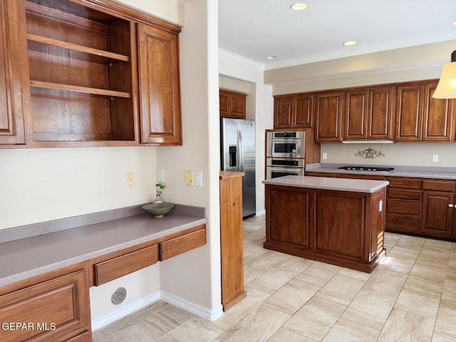 kitchen featuring crown molding, built in desk, a center island, and appliances with stainless steel finishes