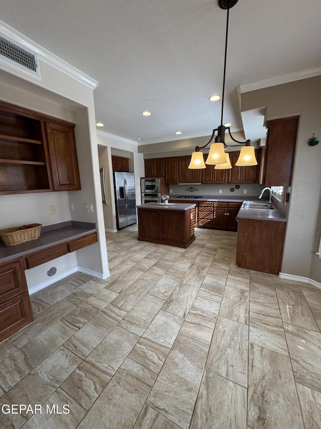 kitchen featuring stainless steel refrigerator with ice dispenser, sink, crown molding, a kitchen island, and pendant lighting