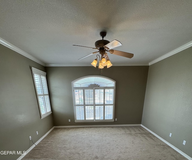 6276 Los Bancos Dr, El Paso, TX 79912 - empty room featuring carpet floors, a textured ceiling, crown molding, and ceiling fan