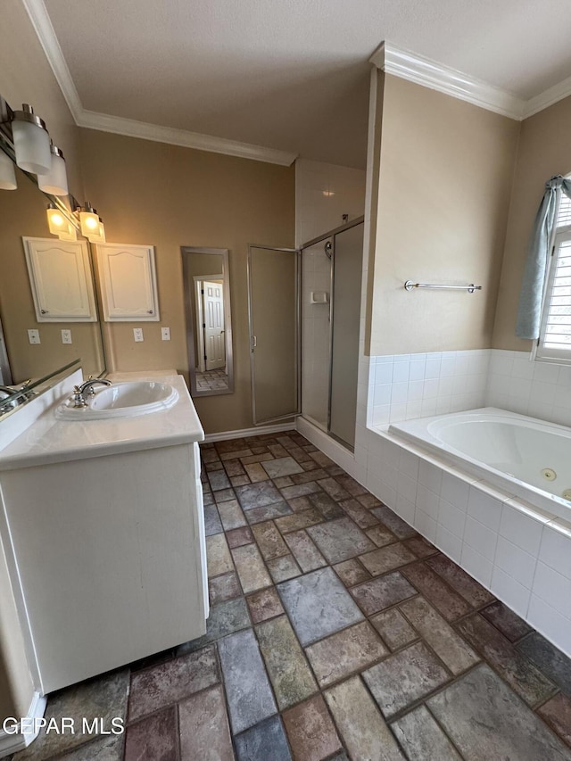 6276 Los Bancos Dr, El Paso, TX 79912 - bathroom with a whirlpool tub, vanity, a stall shower, and crown molding
