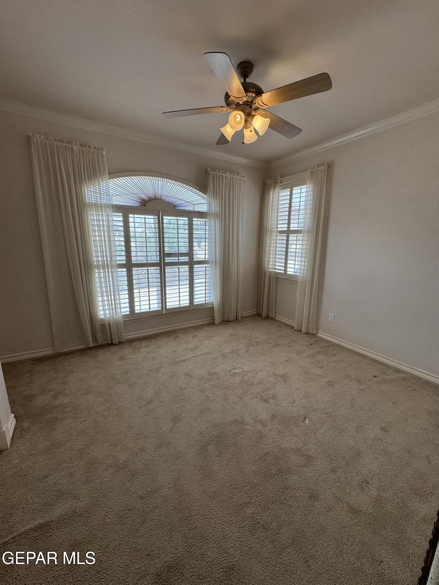 6276 Los Bancos Dr, El Paso, TX 79912 - unfurnished room with ornamental molding, a ceiling fan, and carpet floors