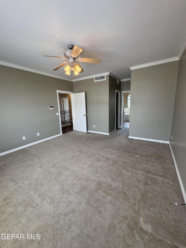 6276 Los Bancos Dr, El Paso, TX 79912 - carpeted empty room featuring a ceiling fan, ornamental molding, and a textured ceiling