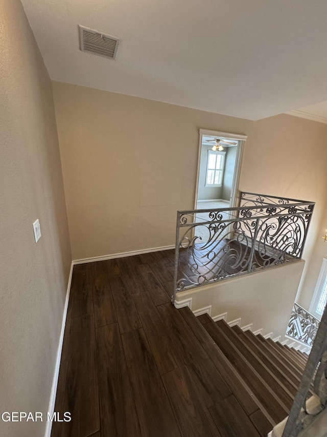 6276 Los Bancos Dr, El Paso, TX 79912 - stairway featuring wood finished floors and baseboards
