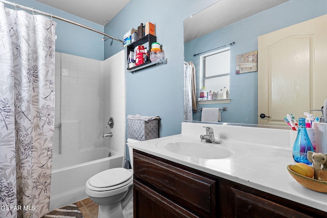 bathroom featuring shower / bath combo with shower curtain, toilet, and vanity