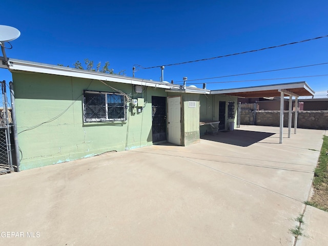 back of property featuring a patio area