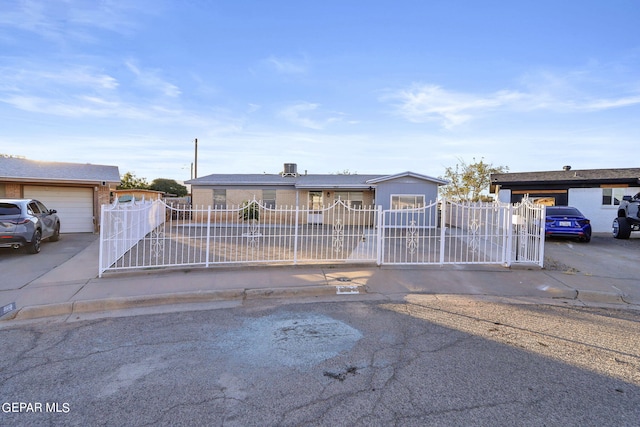 ranch-style home featuring a garage