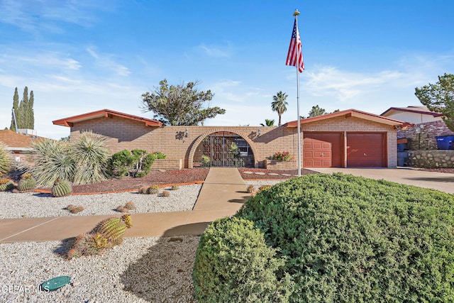 single story home with a garage