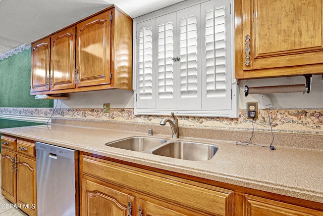 kitchen with sink and stainless steel dishwasher