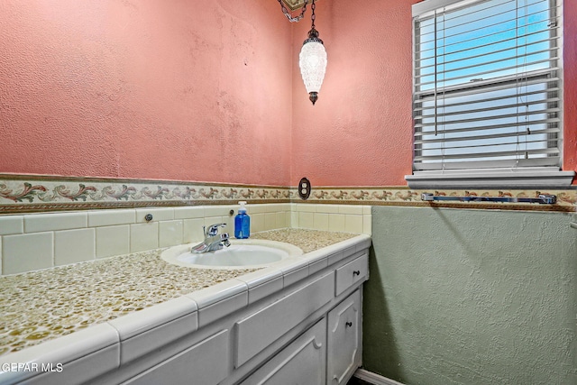 bathroom featuring vanity