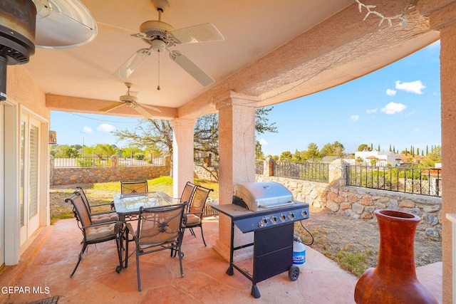 851 Via Alegre Ln, El Paso, TX 79912 - fenced backyard with outdoor dining area, grilling area, a patio, and ceiling fan