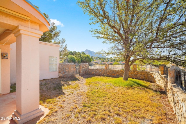 851 Via Alegre Ln, El Paso, TX 79912 - fenced yard with a gate and a mountain view