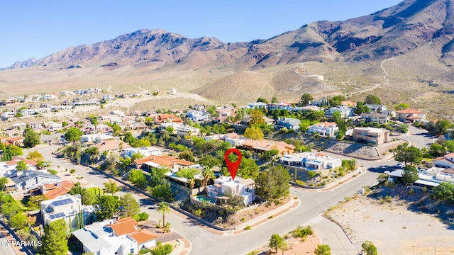 drone / aerial view featuring a mountain view