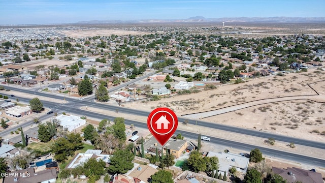 drone / aerial view featuring a mountain view