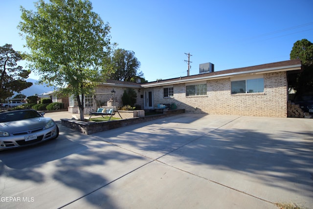 single story home featuring a patio area