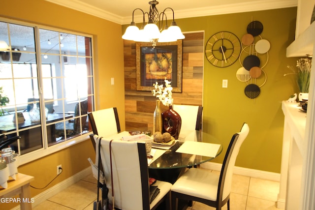 tiled dining room with crown molding and an inviting chandelier