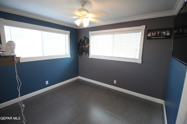 unfurnished room featuring ceiling fan and crown molding