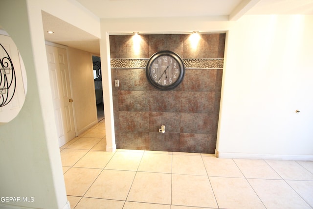 hallway featuring light tile patterned floors