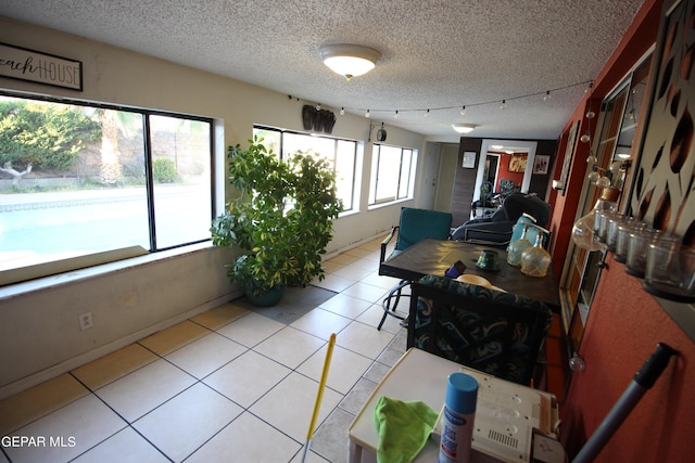 interior space with a textured ceiling