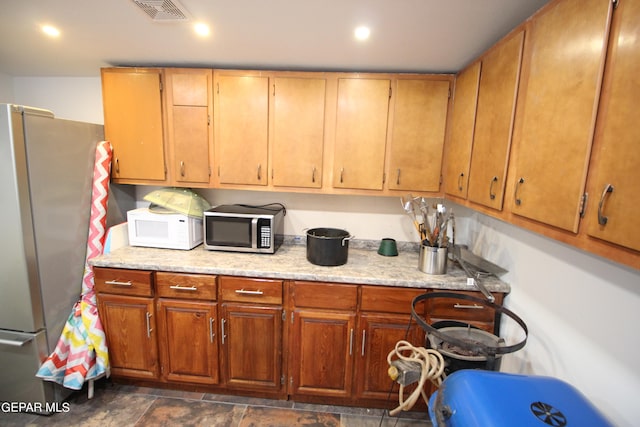 kitchen featuring appliances with stainless steel finishes