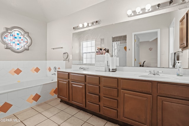 bathroom featuring plus walk in shower, tile patterned floors, and vanity