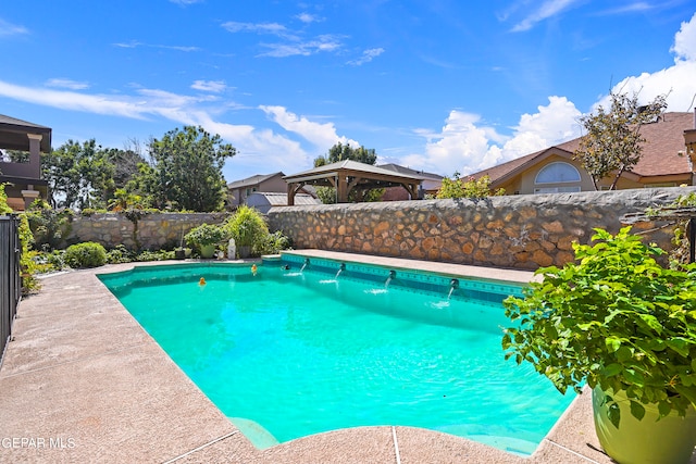 view of pool featuring a gazebo and pool water feature