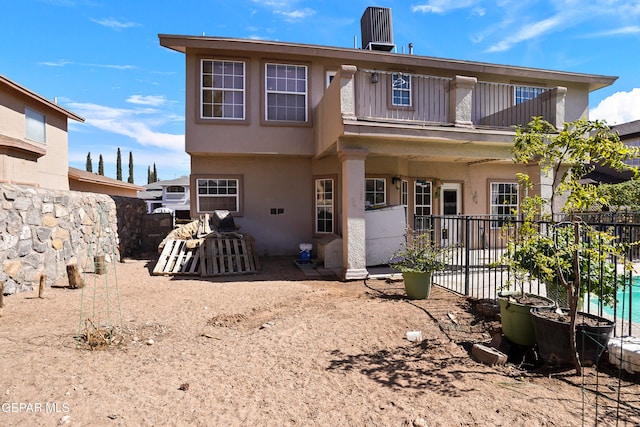 back of property with a patio area