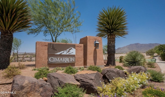 community sign featuring a mountain view