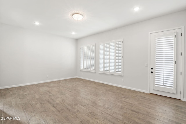 empty room with light wood-type flooring