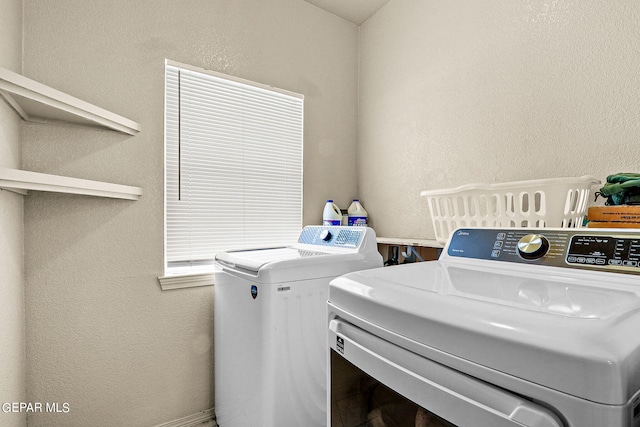 laundry room with washer and clothes dryer