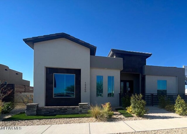 2332 Mike Price Dr, El Paso, TX 79938 - contemporary house featuring fence and stucco siding