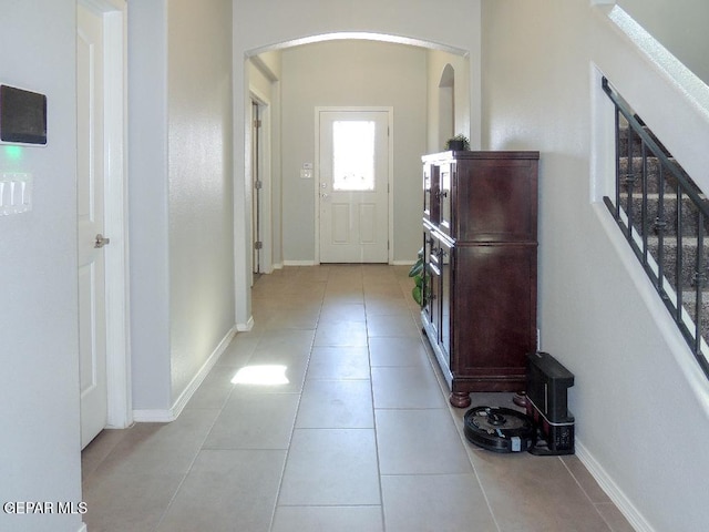 corridor with light tile patterned floors