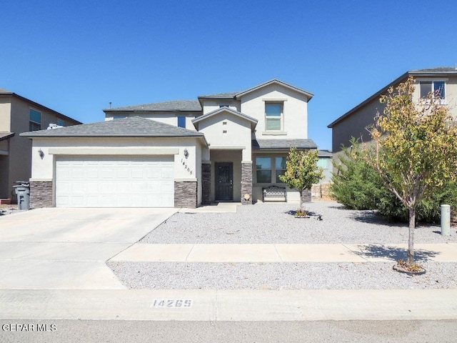 view of front of property with a garage