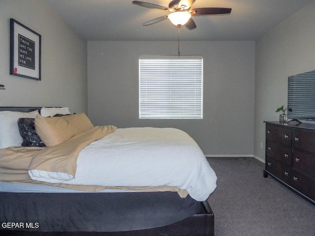 bedroom featuring ceiling fan and carpet floors