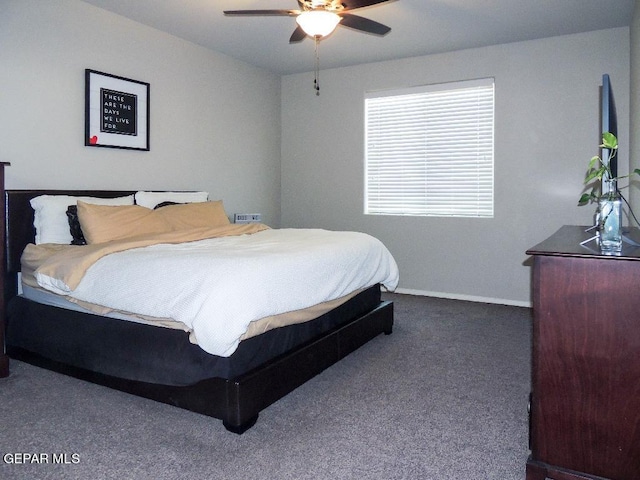 bedroom with ceiling fan and carpet flooring