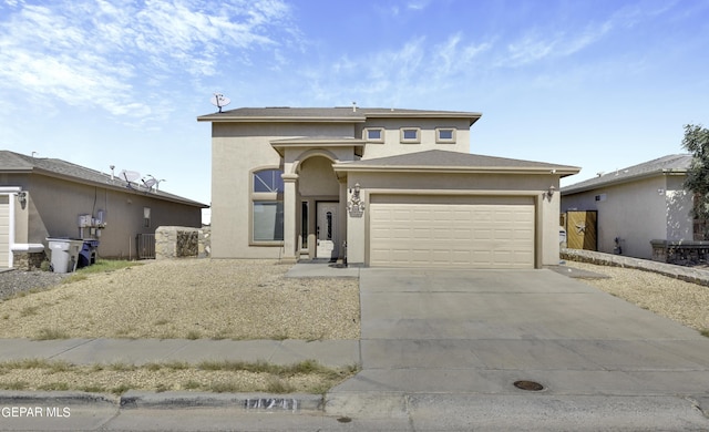 14241 Craggy Rock Ave, El Paso, TX 79938 - traditional home featuring stucco siding, concrete driveway, and an attached garage