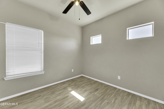 14241 Craggy Rock Ave, El Paso, TX 79938 - empty room featuring a ceiling fan, wood finished floors, and baseboards