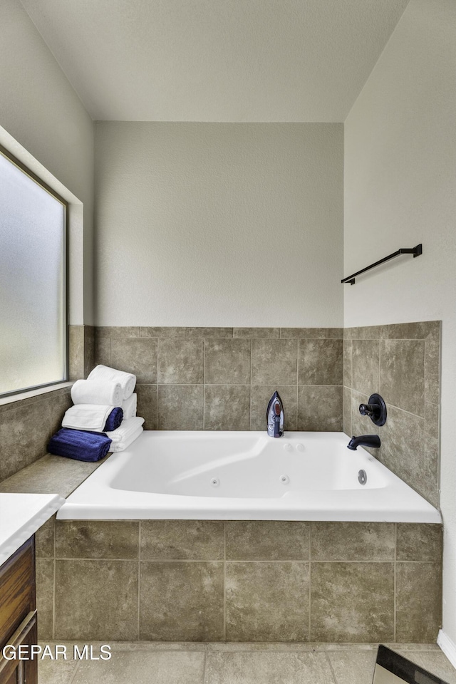 14241 Craggy Rock Ave, El Paso, TX 79938 - full bathroom featuring a jetted tub