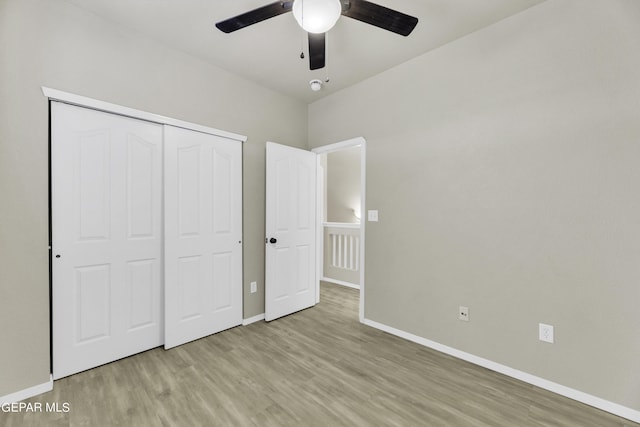 14241 Craggy Rock Ave, El Paso, TX 79938 - unfurnished bedroom with a closet, ceiling fan, light wood-style flooring, and baseboards