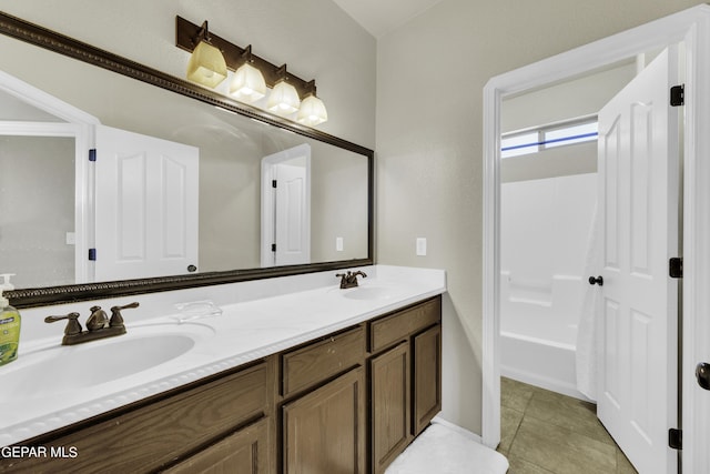 14241 Craggy Rock Ave, El Paso, TX 79938 - bathroom with tile patterned flooring, a sink, and double vanity