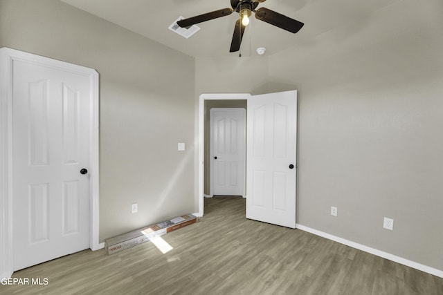 14241 Craggy Rock Ave, El Paso, TX 79938 - unfurnished bedroom with visible vents, ceiling fan, wood finished floors, and baseboards
