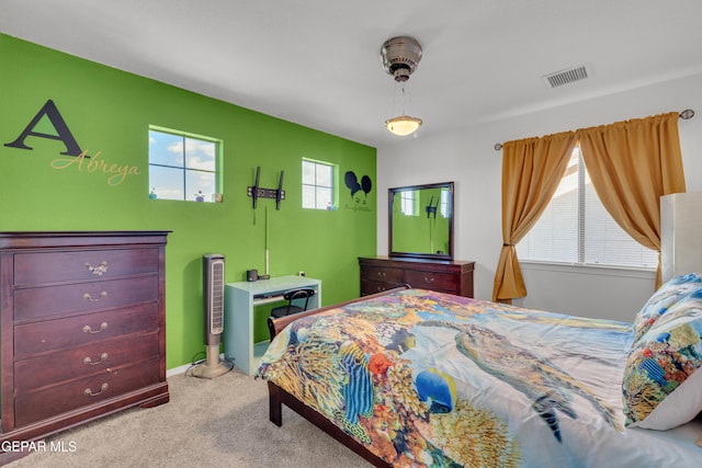 bedroom featuring carpet