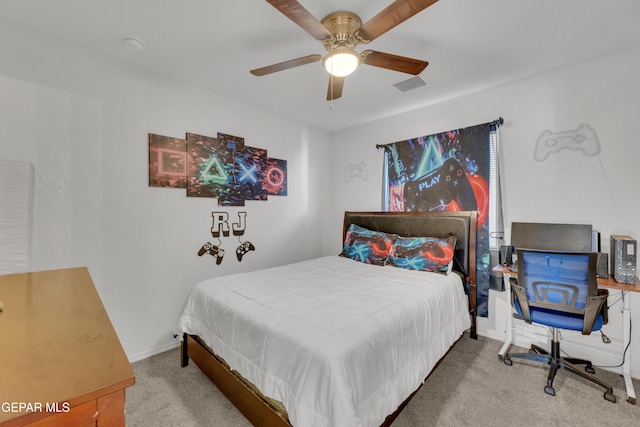 bedroom with ceiling fan and carpet flooring