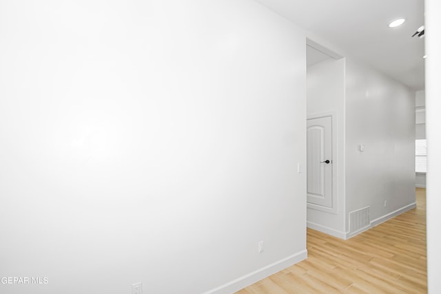 hallway featuring light hardwood / wood-style floors