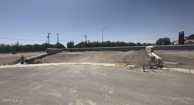 12044 Cotton Cloud Way, Socorro, TX 79927 - view of road featuring street lighting