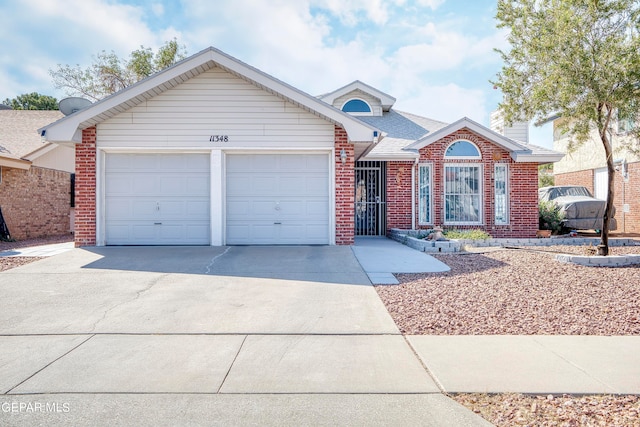 single story home with a garage