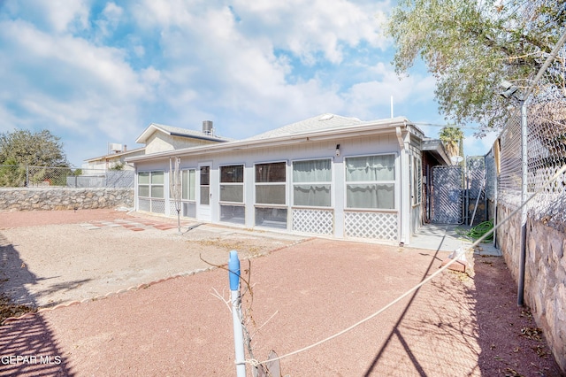 rear view of house with a patio area