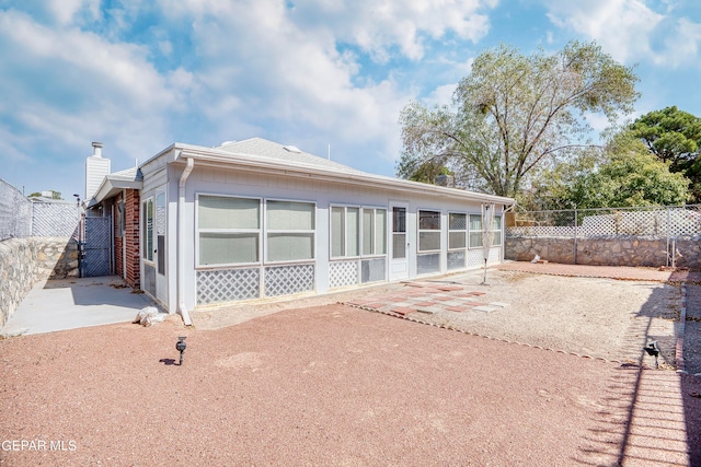 back of property with a patio area