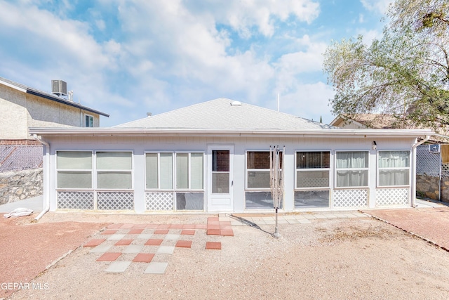 back of house with a patio