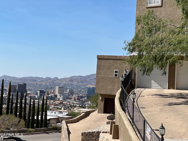 view of home's exterior with a mountain view