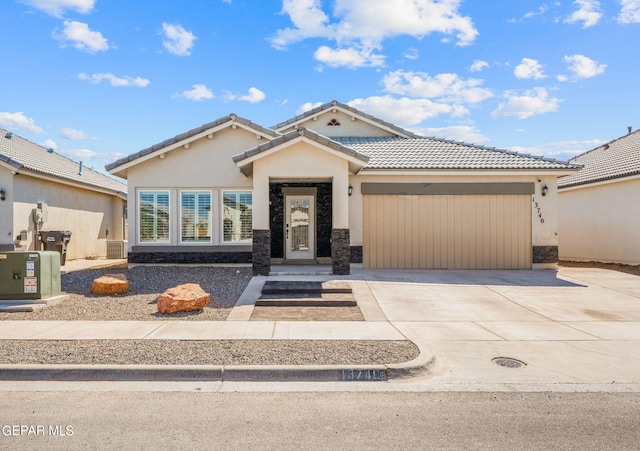 view of front of property featuring a garage